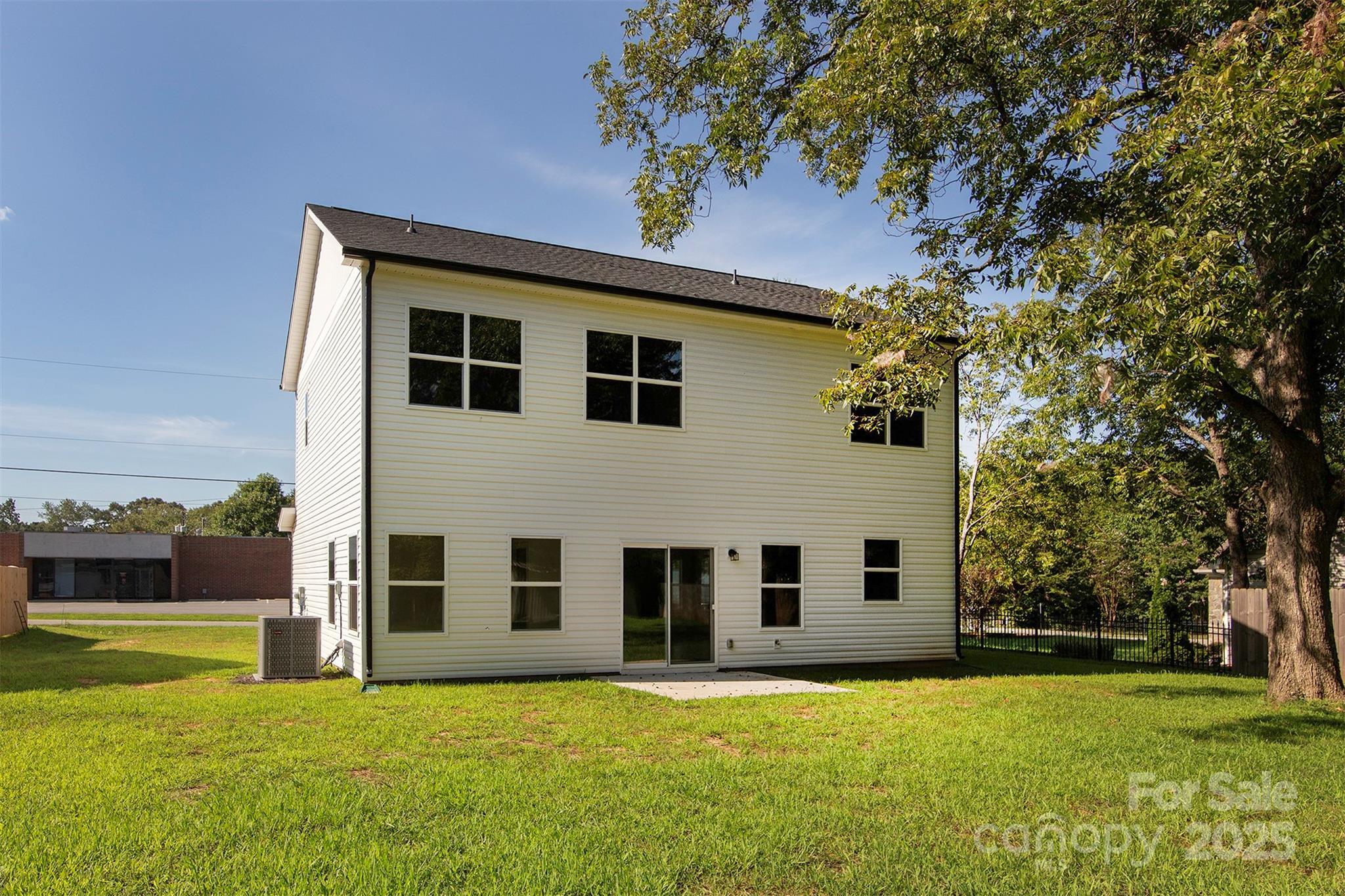118 Durham Road Stanley, NC 28164 - Photo 21 of 24 a big house with yard in front of it