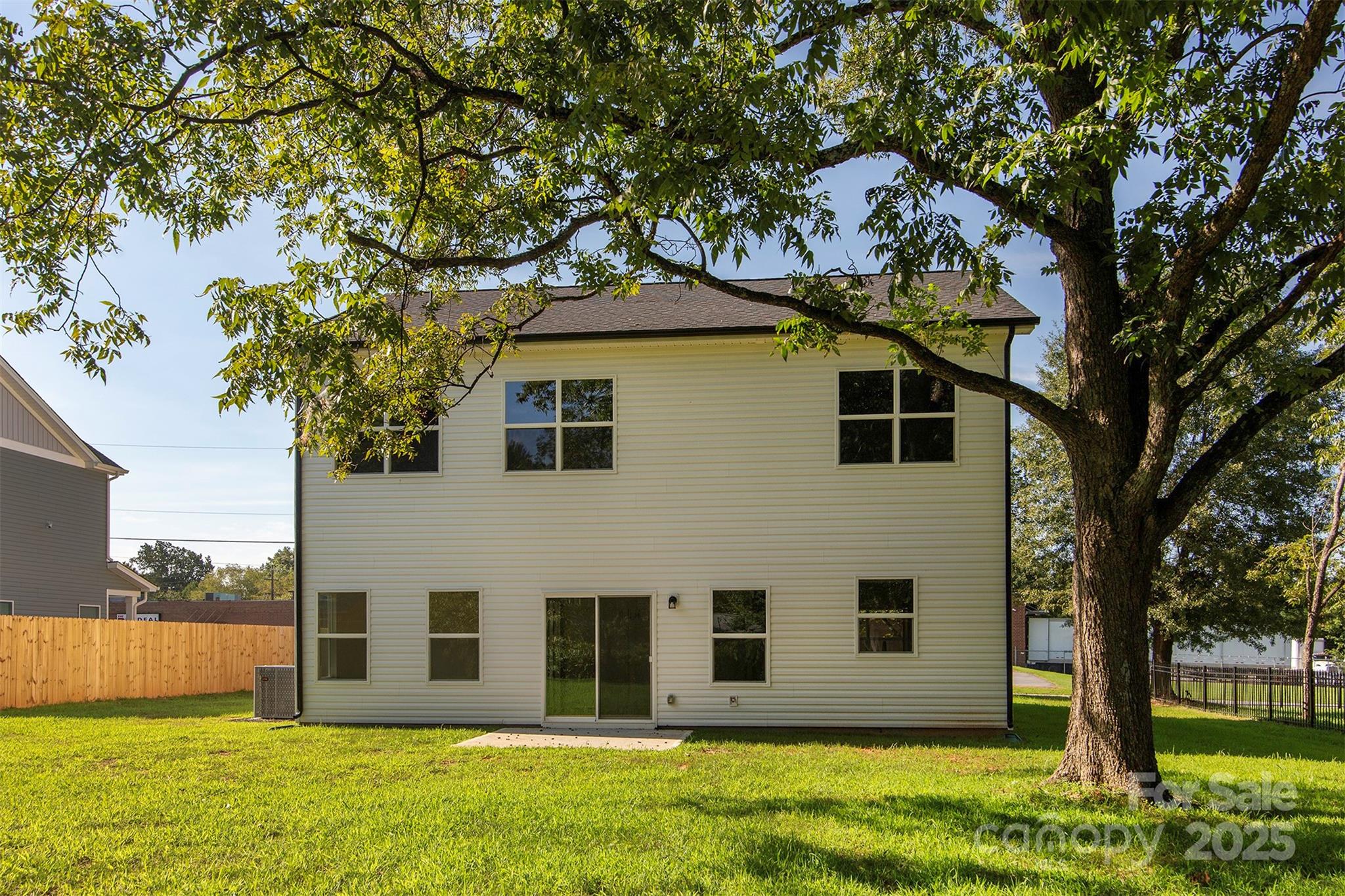 118 Durham Road Stanley, NC 28164 - Photo 22 of 24 a view of a house with a yard