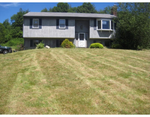 111 Dana Road Oxford, MA 01540 - Photo 1 of 1 a front view of a house with yard