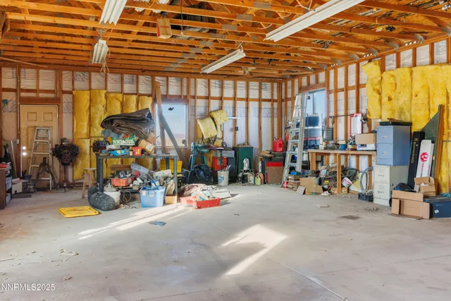 a view of wooden floor and a living room