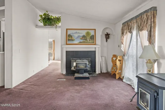 a kitchen with stainless steel appliances granite countertop a stove and a refrigerator