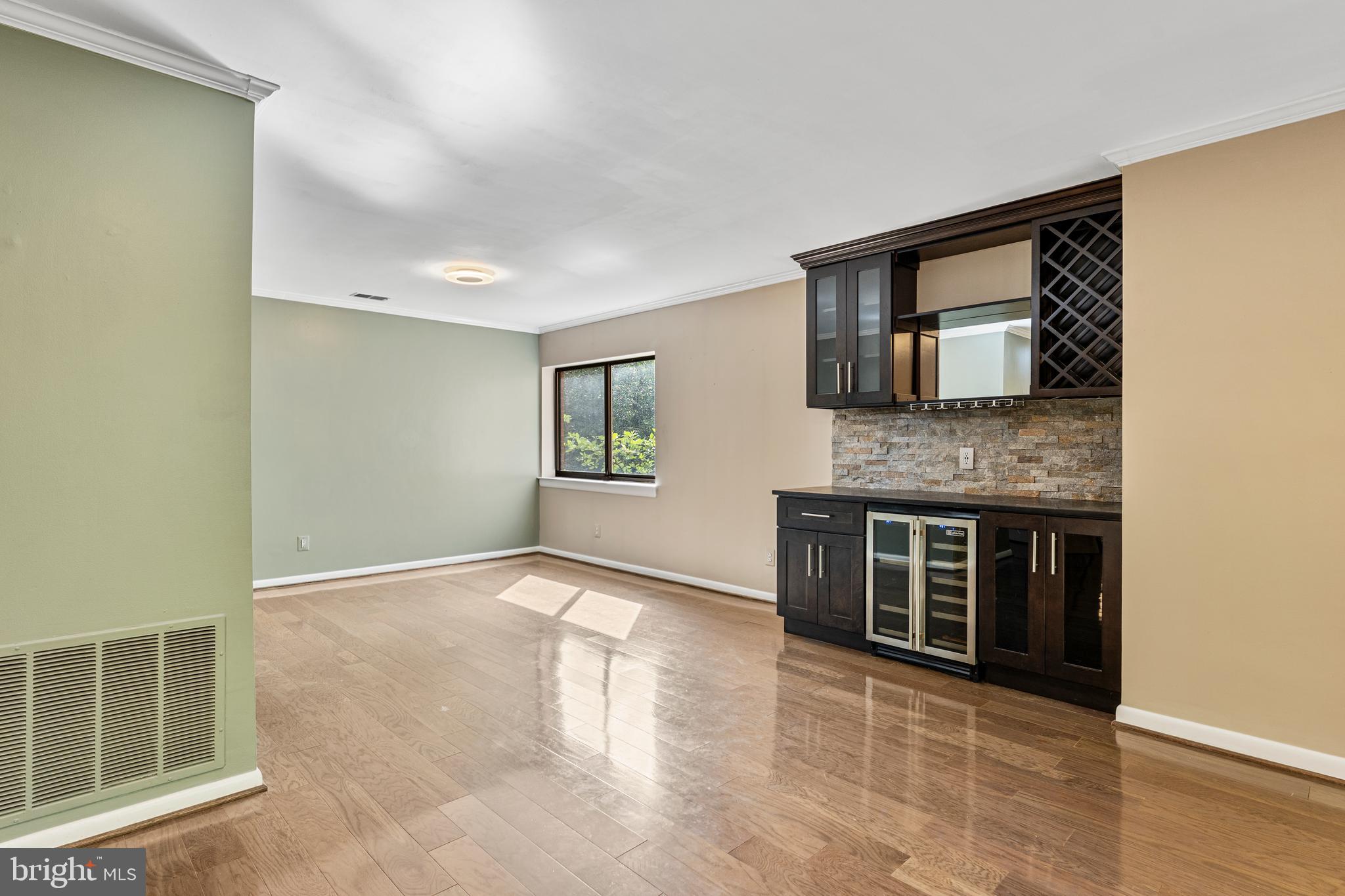 11120 Harbor Court, Unit 1120 Reston, VA 20191 - Photo 21 of 26 a view of an empty room with window and fireplace