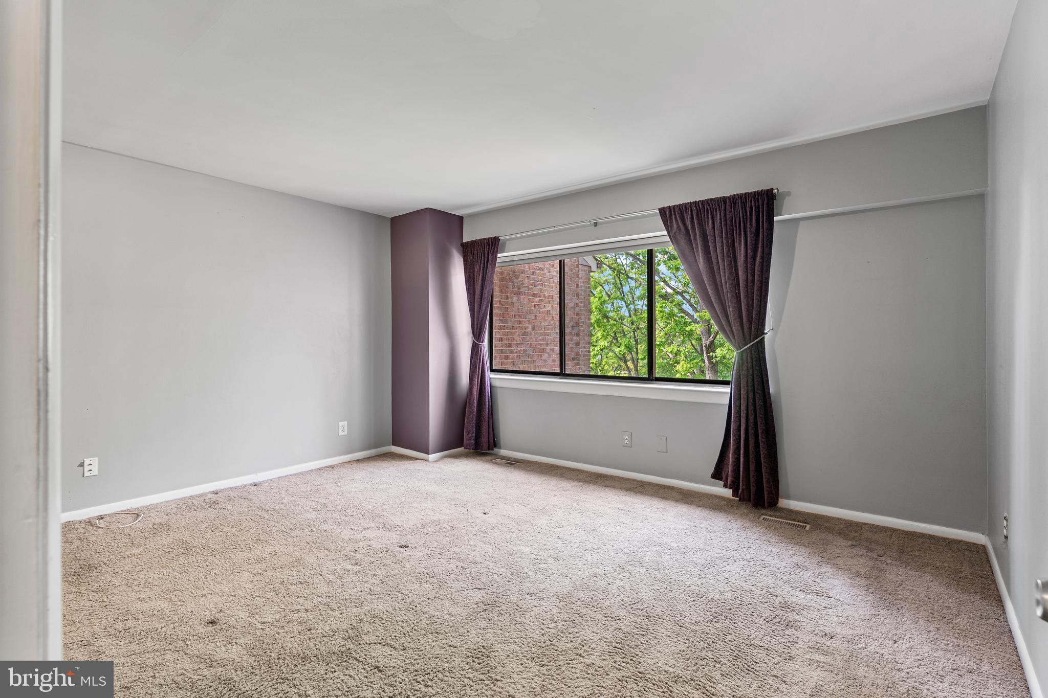 11120 Harbor Court, Unit 1120 Reston, VA 20191 - Photo 6 of 26 a view of an empty room with a window