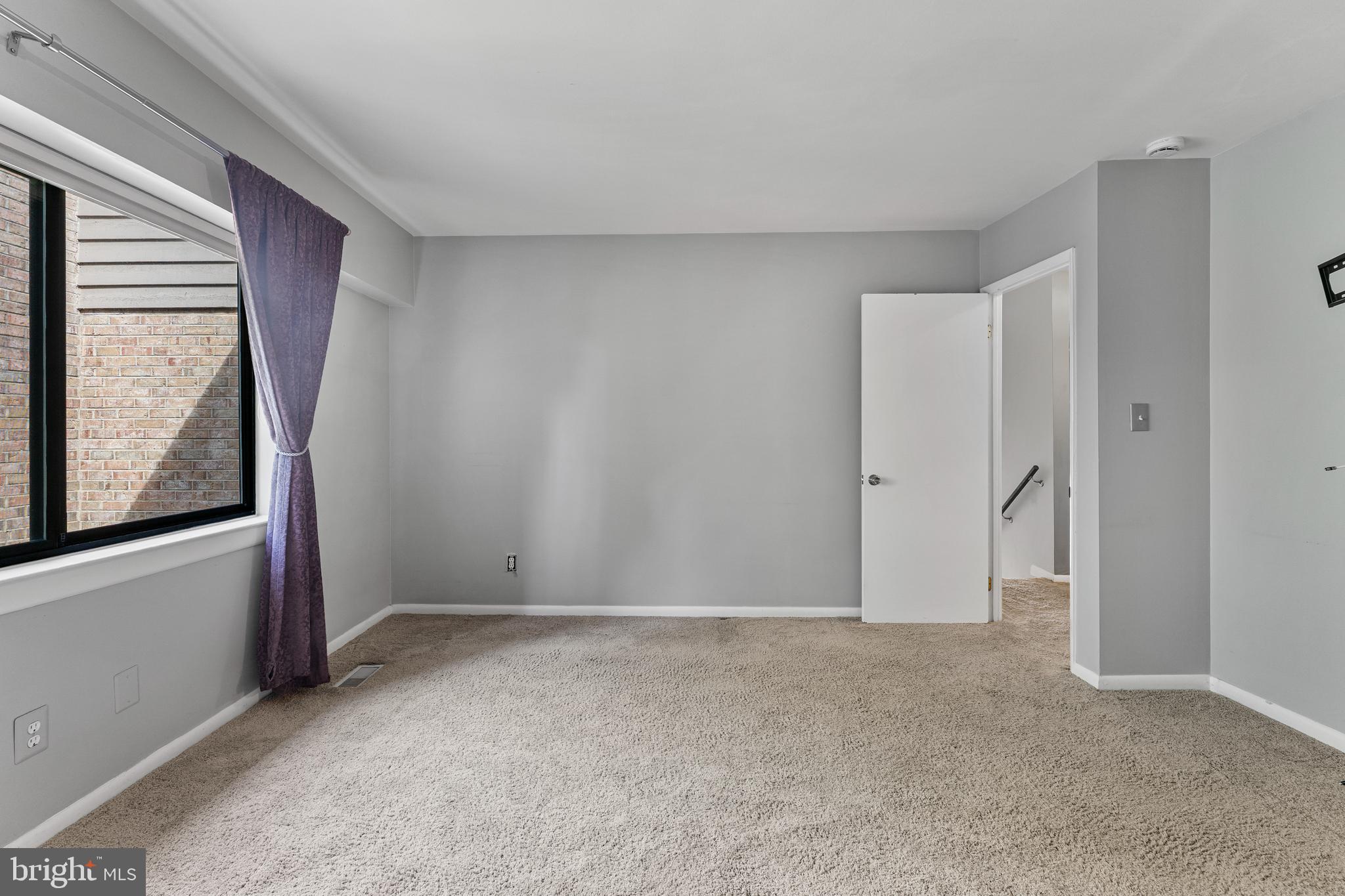 11120 Harbor Court, Unit 1120 Reston, VA 20191 - Photo 7 of 26 a view of an empty room with a window