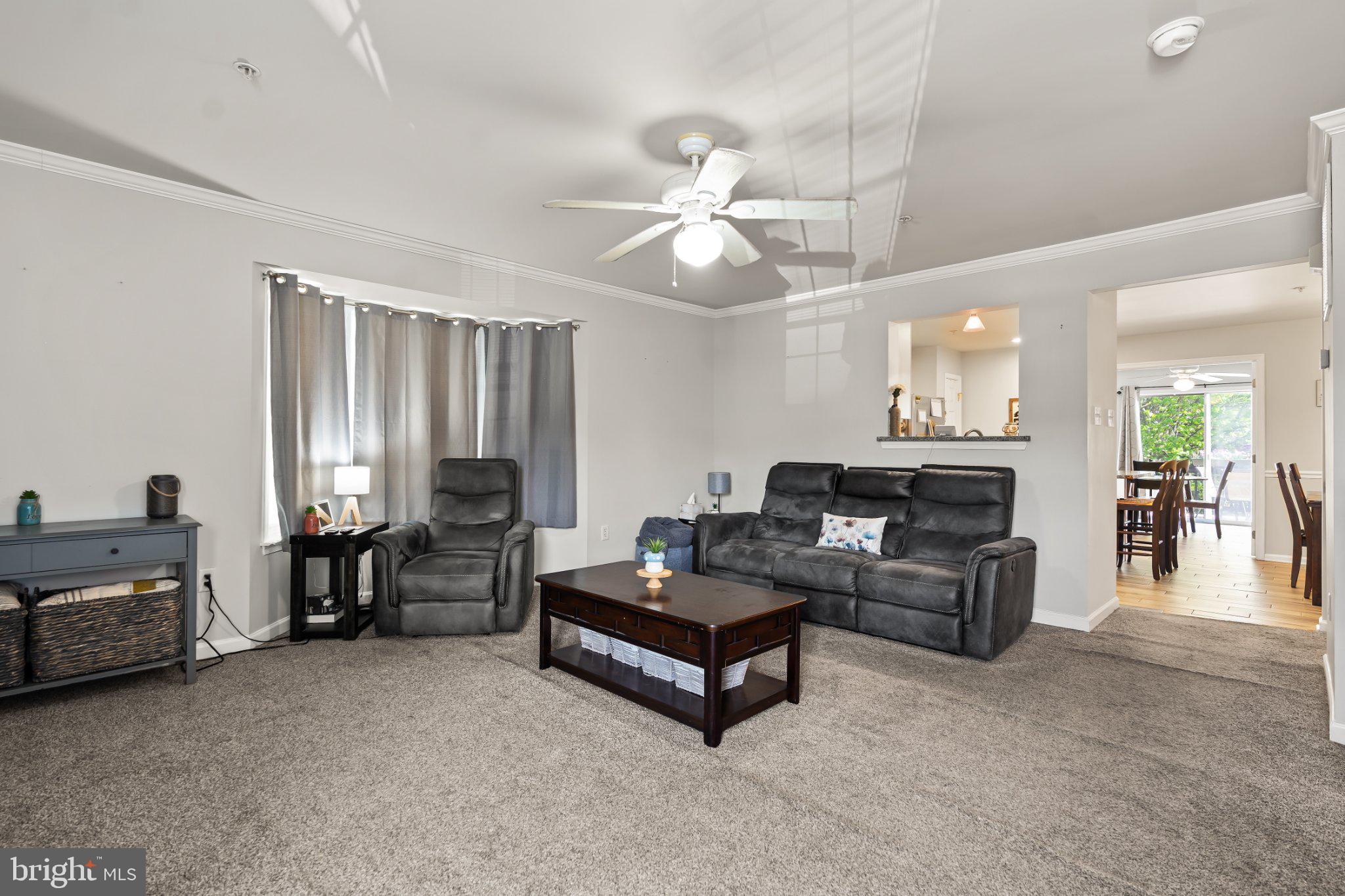 128 Sentry Ridge Smithsburg, MD 21783 - Photo 11 of 41 a living room with furniture and a chandelier