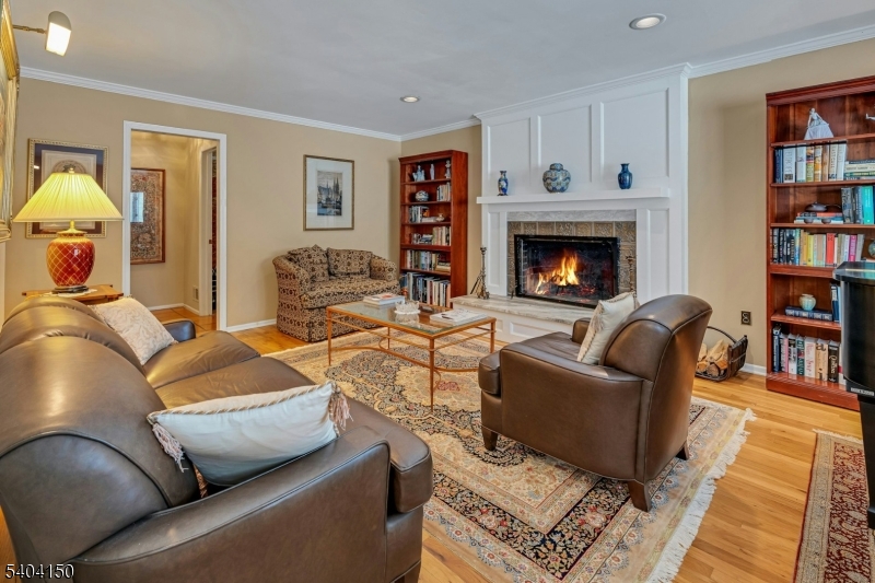31 Garfield Avenue Madison, NJ 07940 - Photo 14 of 47 a living room with furniture and a fireplace