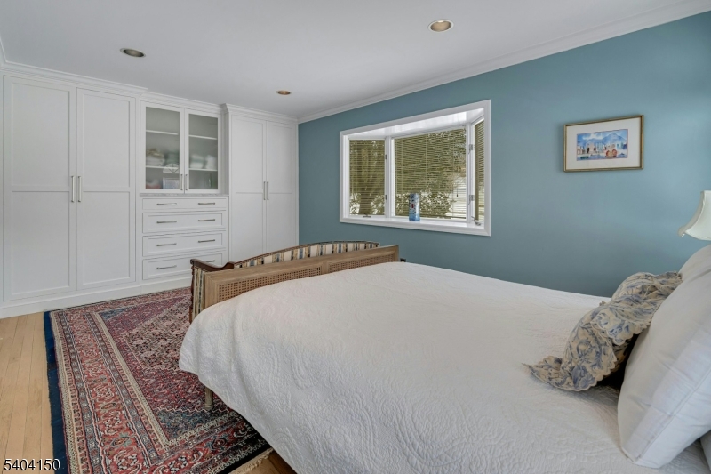 31 Garfield Avenue Madison, NJ 07940 - Photo 20 of 47 a bedroom with a bed and a window