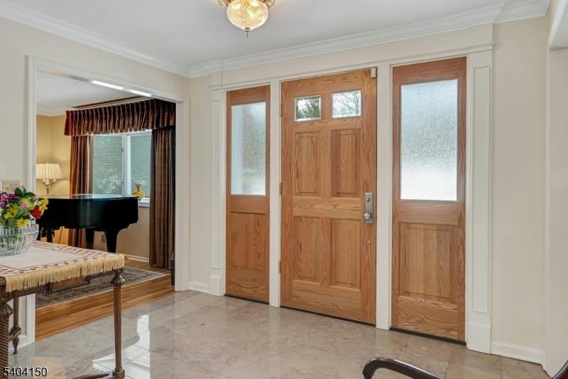 31 Garfield Avenue Madison, NJ 07940 - Photo 2 of 47 an entryway with a workspace
