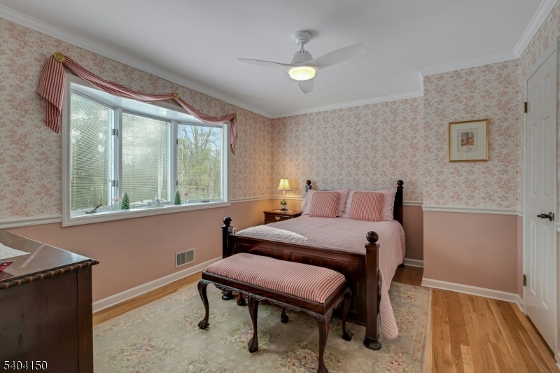 31 Garfield Avenue Madison, NJ 07940 - Photo 32 of 47 a bed room with a bed and a window