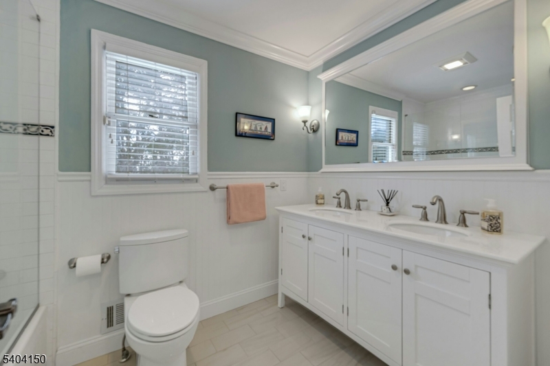 31 Garfield Avenue Madison, NJ 07940 - Photo 34 of 47 a view of bathroom with a toilet sink and mirror