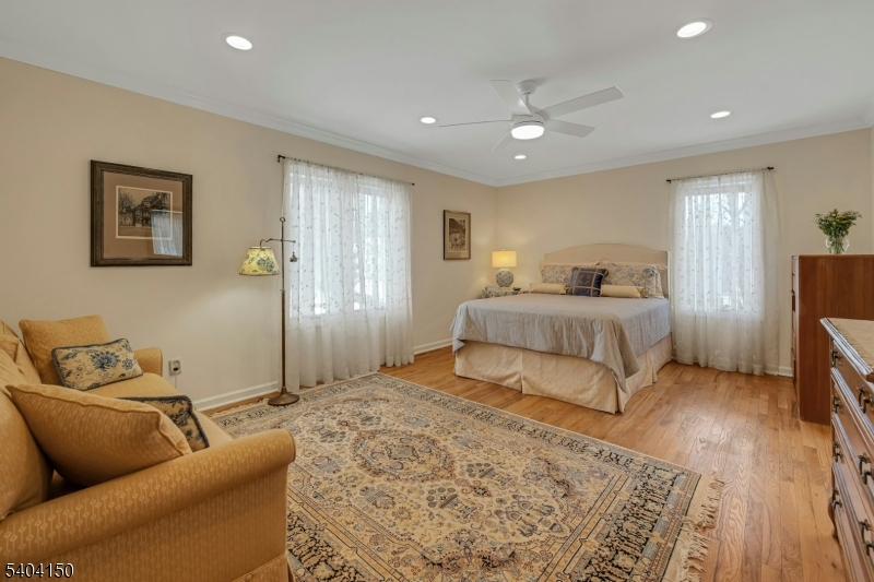 31 Garfield Avenue Madison, NJ 07940 - Photo 36 of 47 a bedroom with a bed and a couch