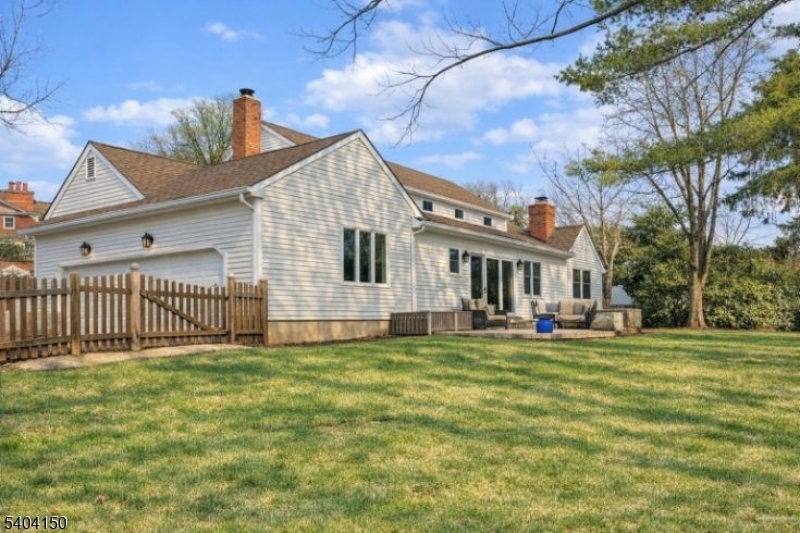 31 Garfield Avenue Madison, NJ 07940 - Photo 41 of 47 a view of a house with a yard and deck