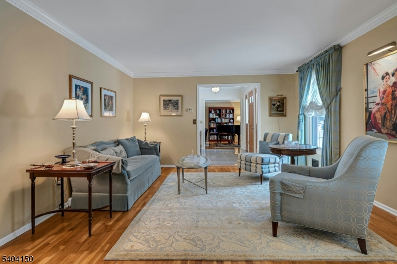 31 Garfield Avenue Madison, NJ 07940 - Photo 6 of 47 a living room with furniture and a wooden floor