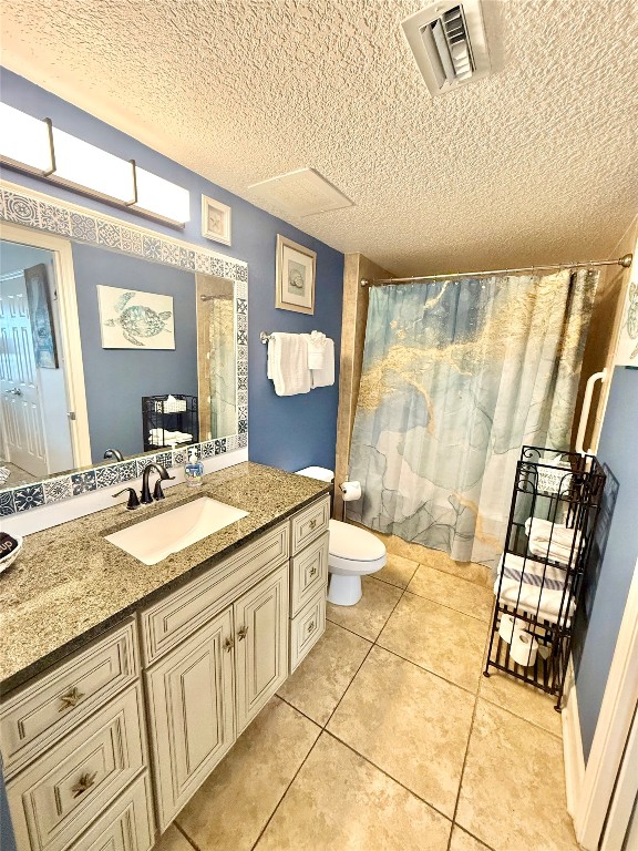 32 South Fletcher Avenue, Unit 105 Fernandina Beach, FL 32034 - Photo 9 of 16 a bathroom with a granite countertop sink a mirror and a shower