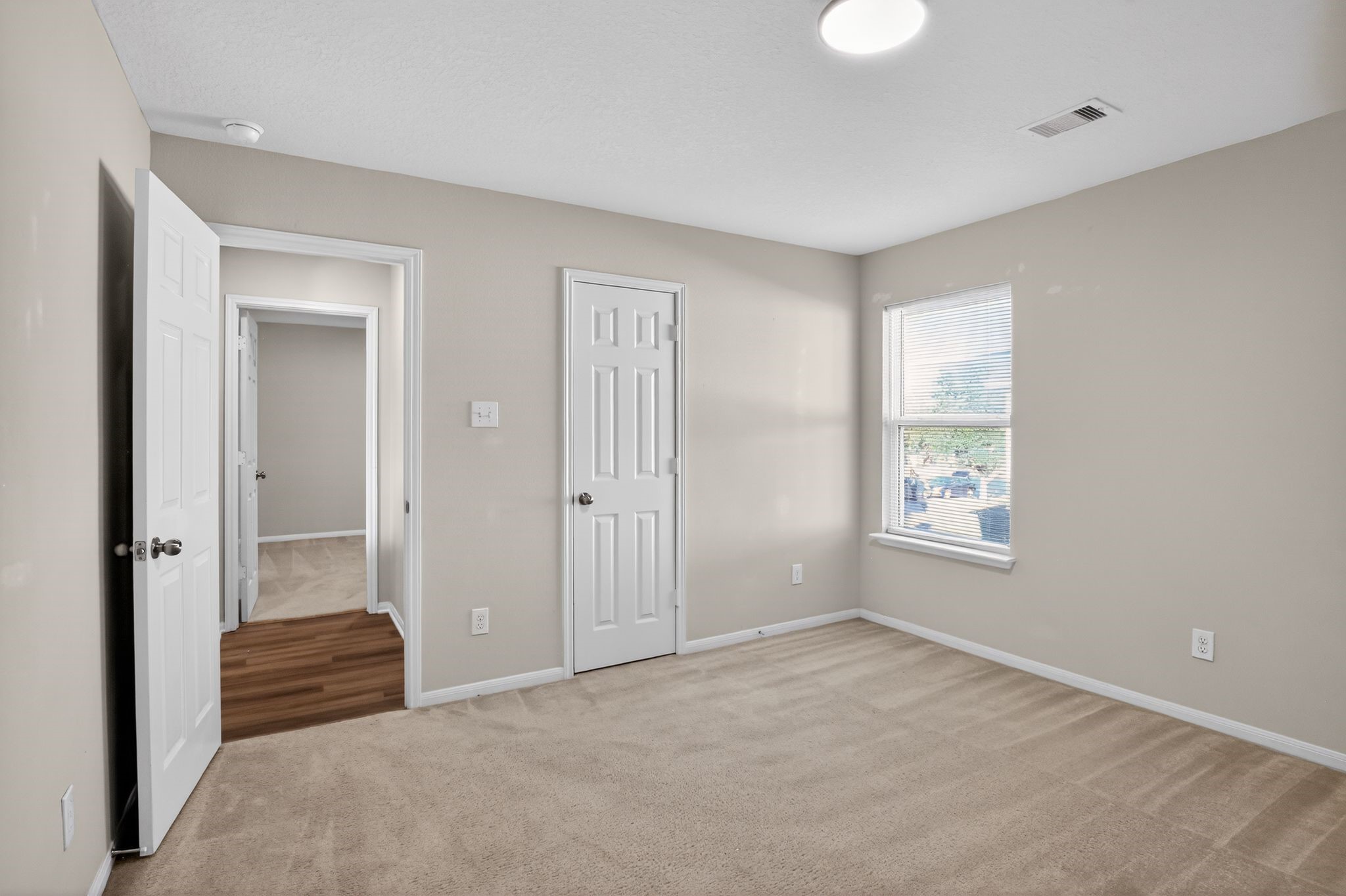 4938 Yearling Ridge Court Katy, TX 77449 - Photo 21 of 29 a bedroom with a bed and a window