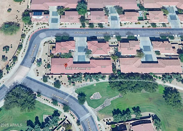 an aerial view of a swimming pool and outdoor space