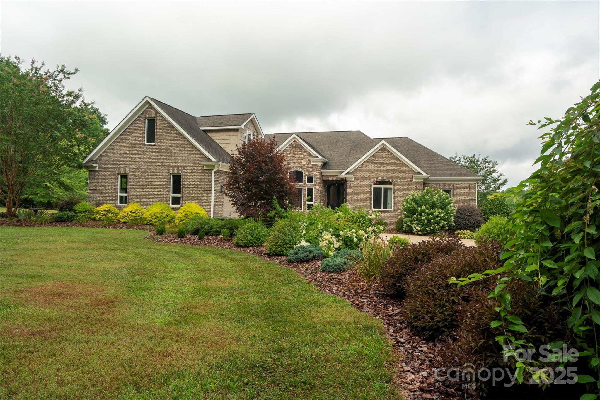 8340 Highway 801 Mount Ulla, NC 28125 - Photo 11 of 47 a front view of house with yard and green space
