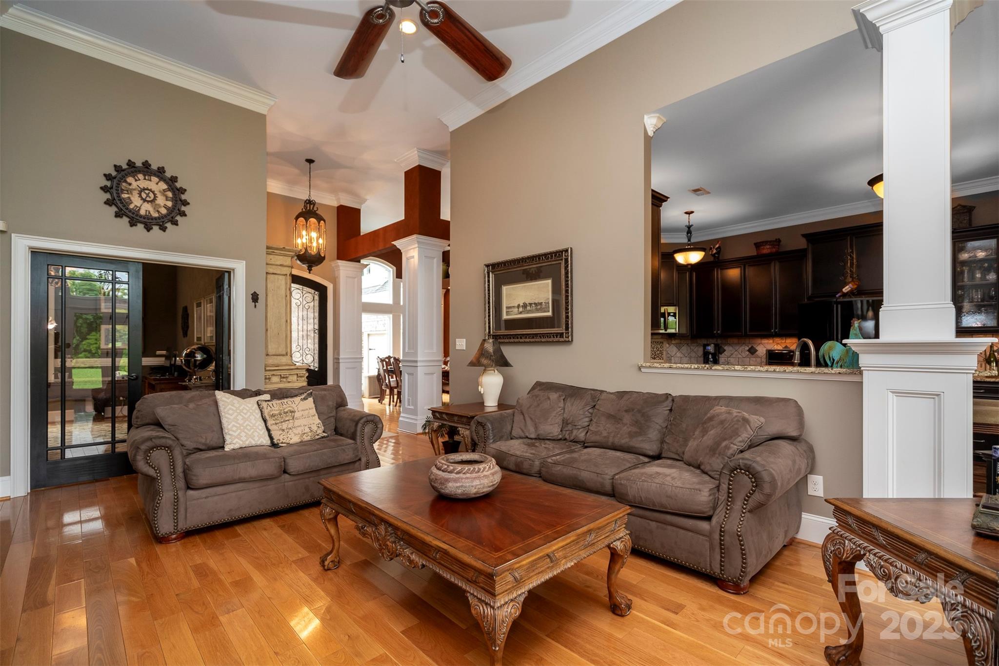 8340 Highway 801 Mount Ulla, NC 28125 - Photo 20 of 47 a living room with furniture fireplace and a chandelier