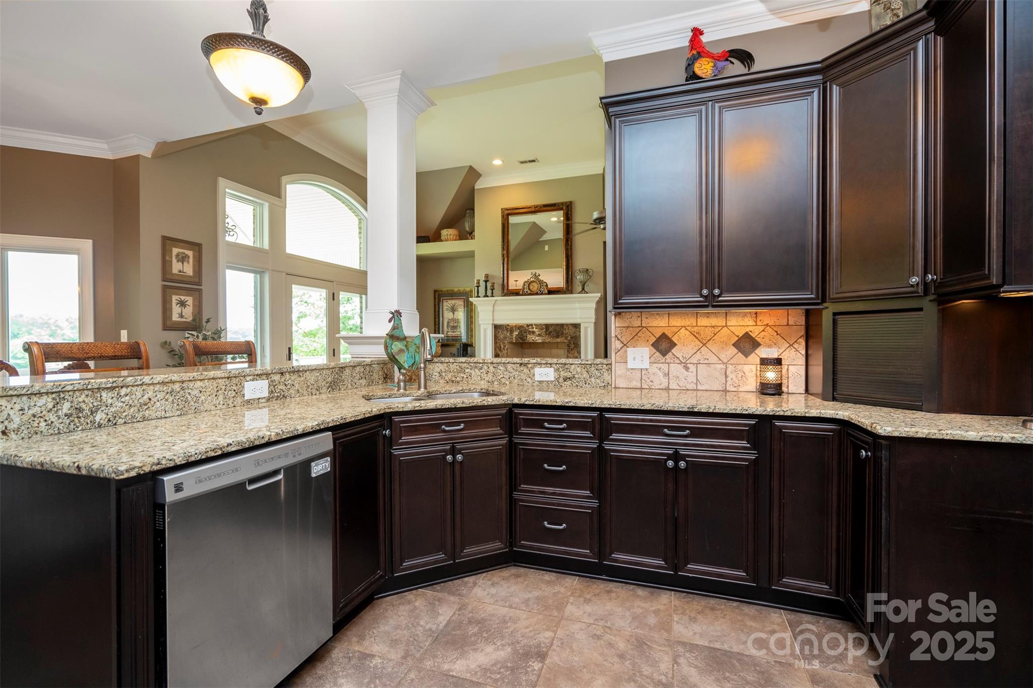 8340 Highway 801 Mount Ulla, NC 28125 - Photo 25 of 47 a kitchen with granite countertop stainless steel appliances a sink stove and cabinets