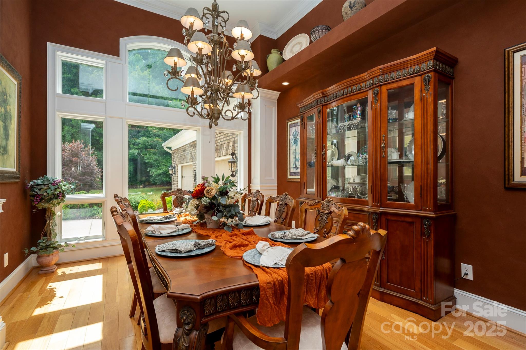 8340 Highway 801 Mount Ulla, NC 28125 - Photo 27 of 47 a view of a dining room with furniture wooden floor and chandelier