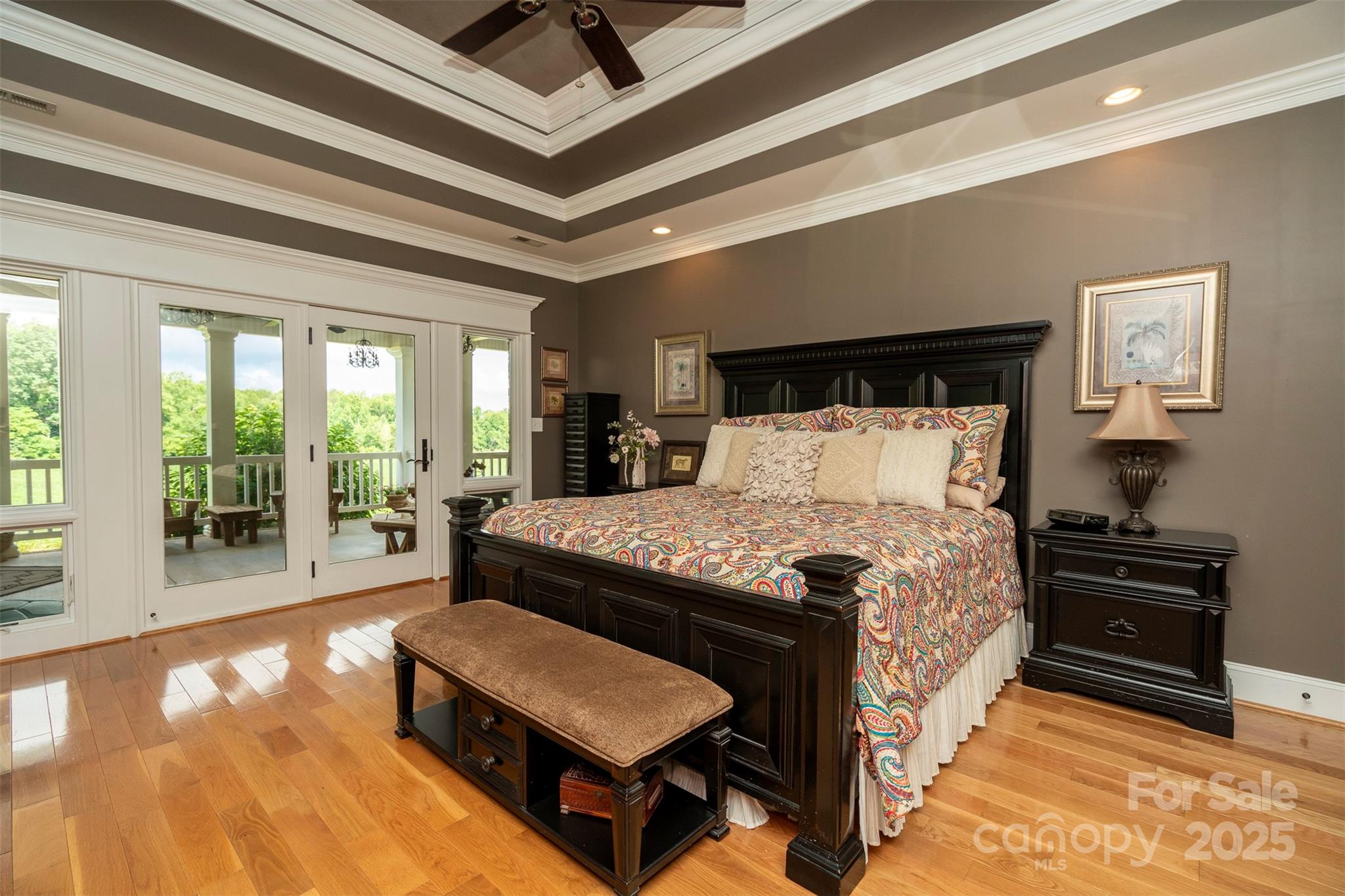 8340 Highway 801 Mount Ulla, NC 28125 - Photo 29 of 47 a bedroom with a bed and glass walk in closet