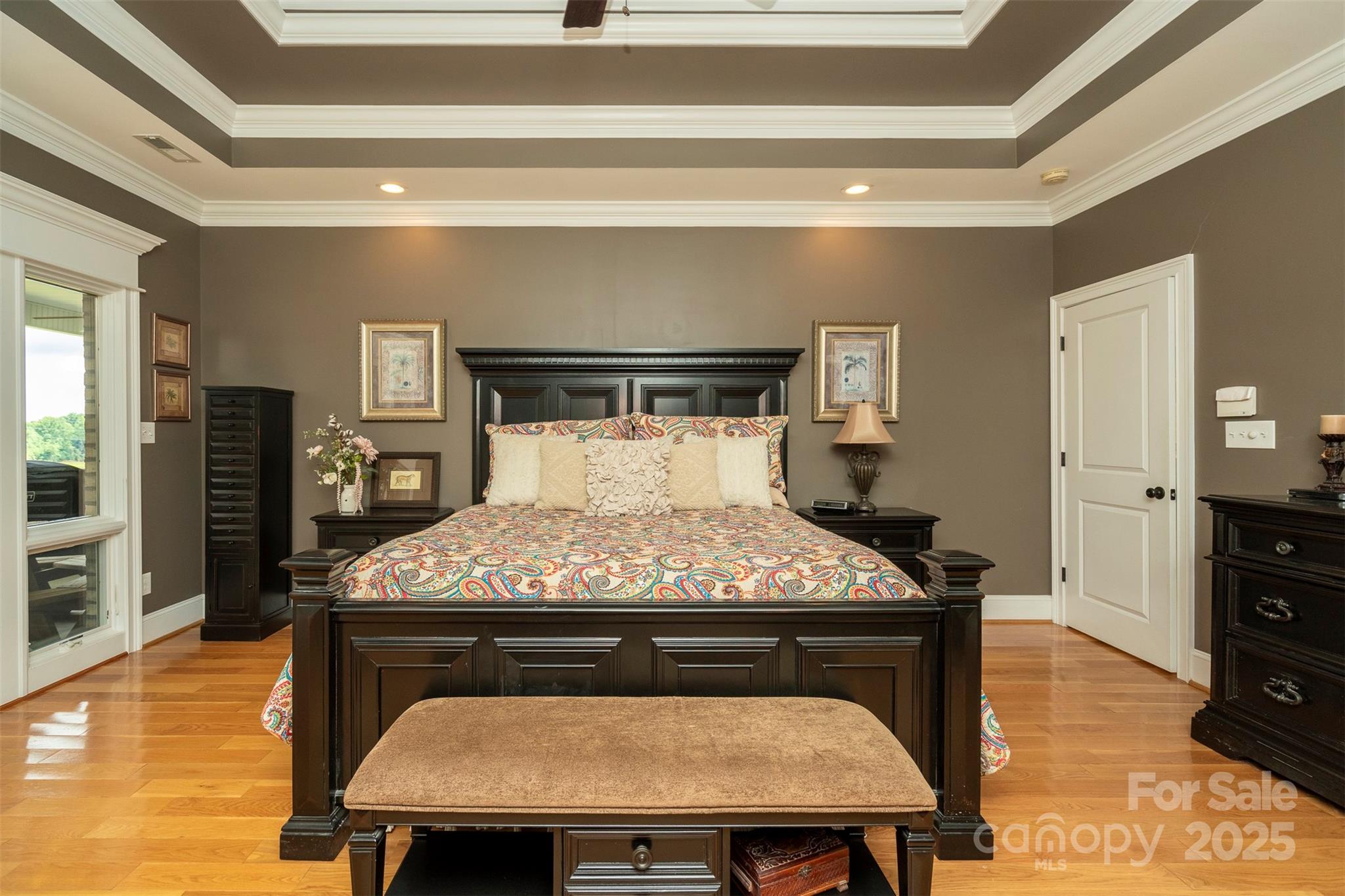 8340 Highway 801 Mount Ulla, NC 28125 - Photo 30 of 47 a bed sitting in a bedroom next to a window with pc on the table