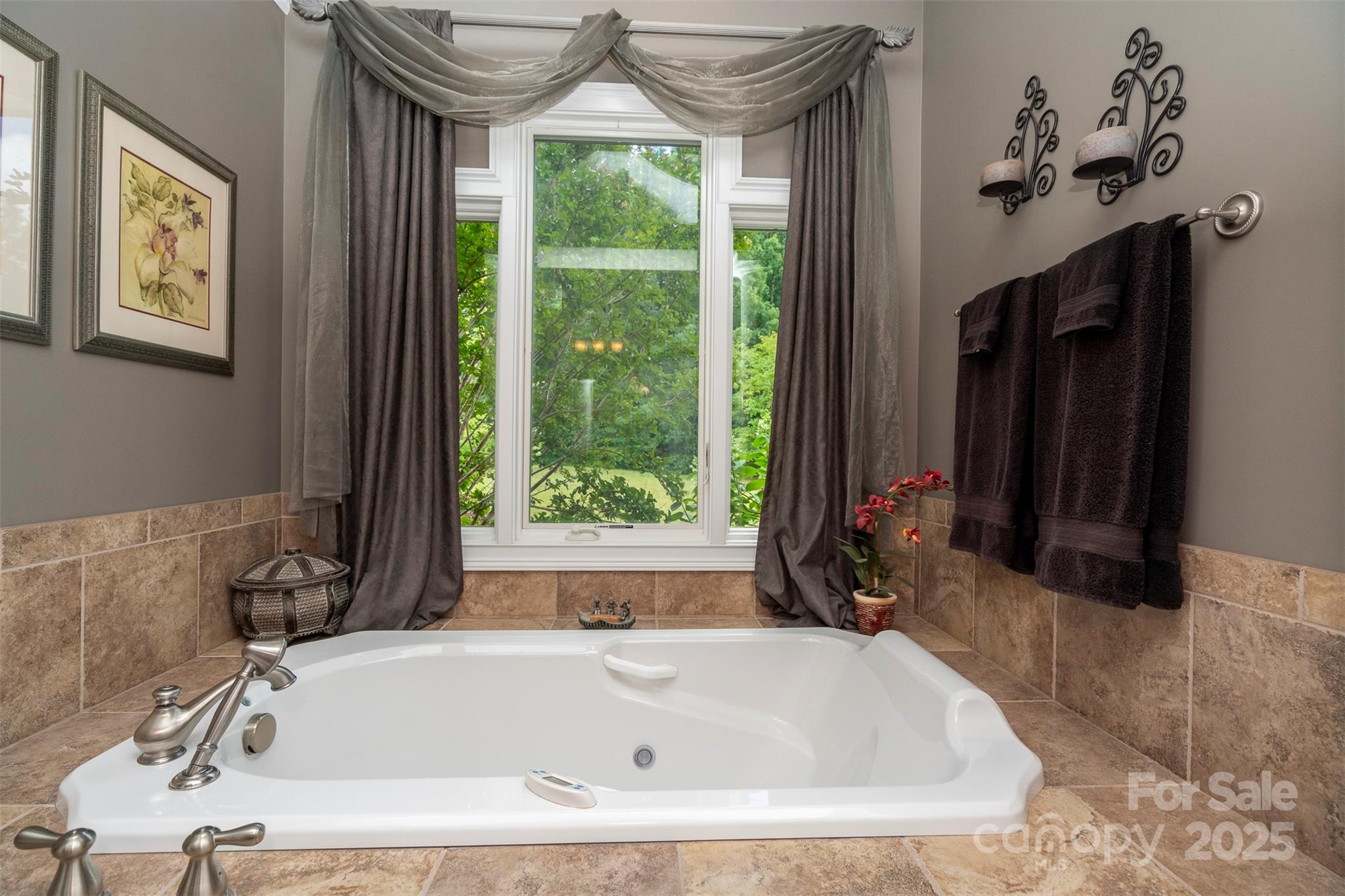 8340 Highway 801 Mount Ulla, NC 28125 - Photo 34 of 47 a white bath tub sitting in a bathroom next to a window