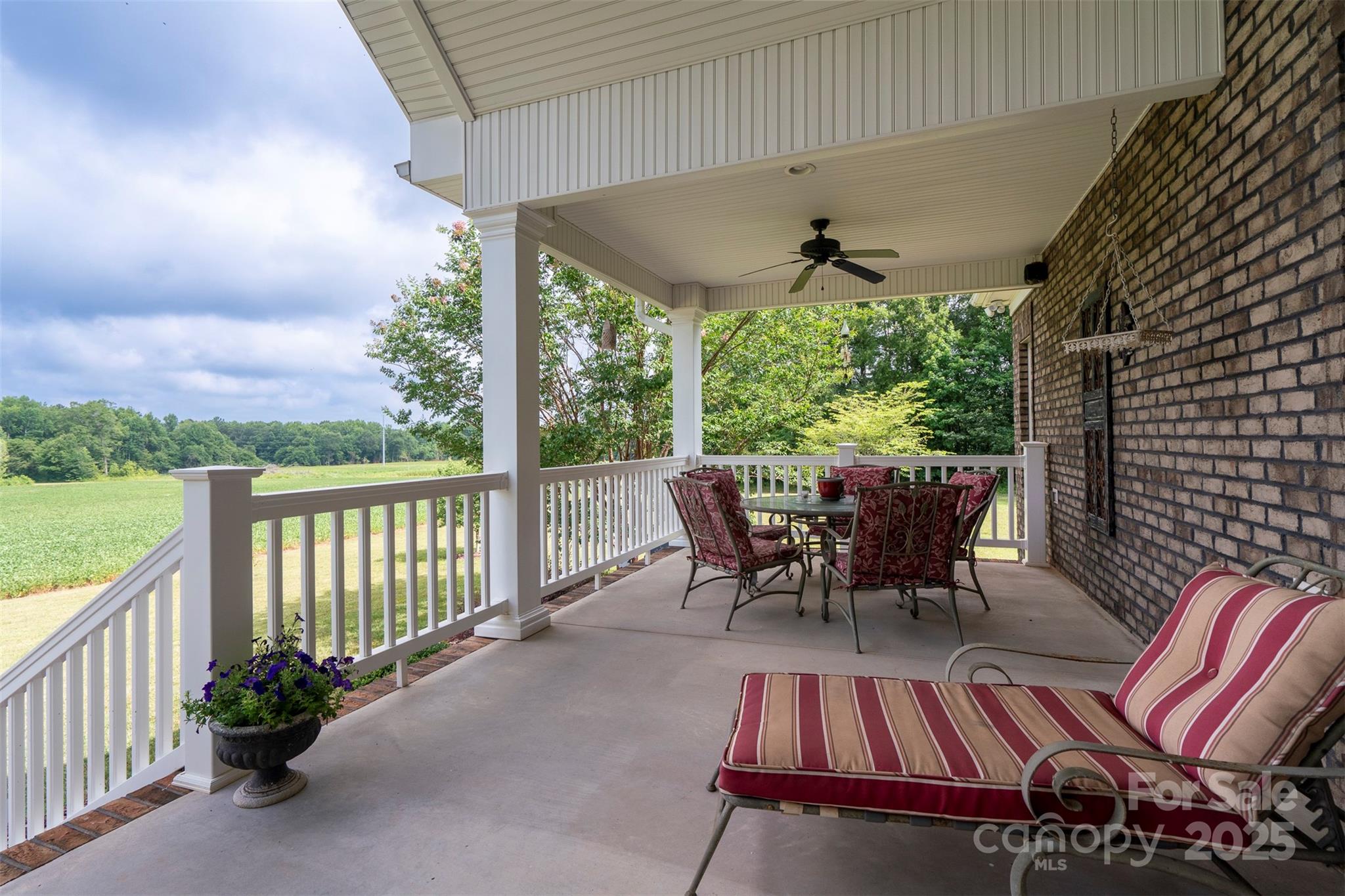 8340 Highway 801 Mount Ulla, NC 28125 - Photo 35 of 47 a view of a patio with a table chairs and a backyard