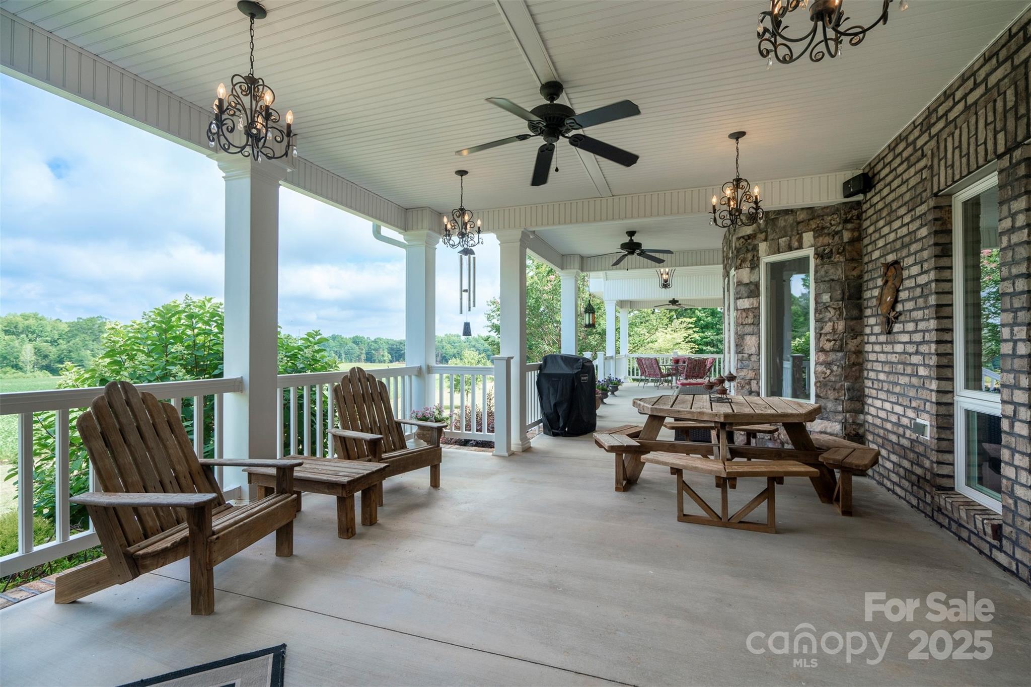 8340 Highway 801 Mount Ulla, NC 28125 - Photo 40 of 47 a living room with furniture and a large window