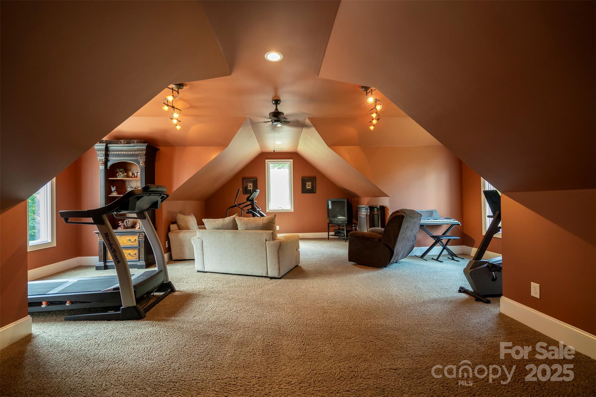 8340 Highway 801 Mount Ulla, NC 28125 - Photo 43 of 47 a room with gym equipment and air hockey table