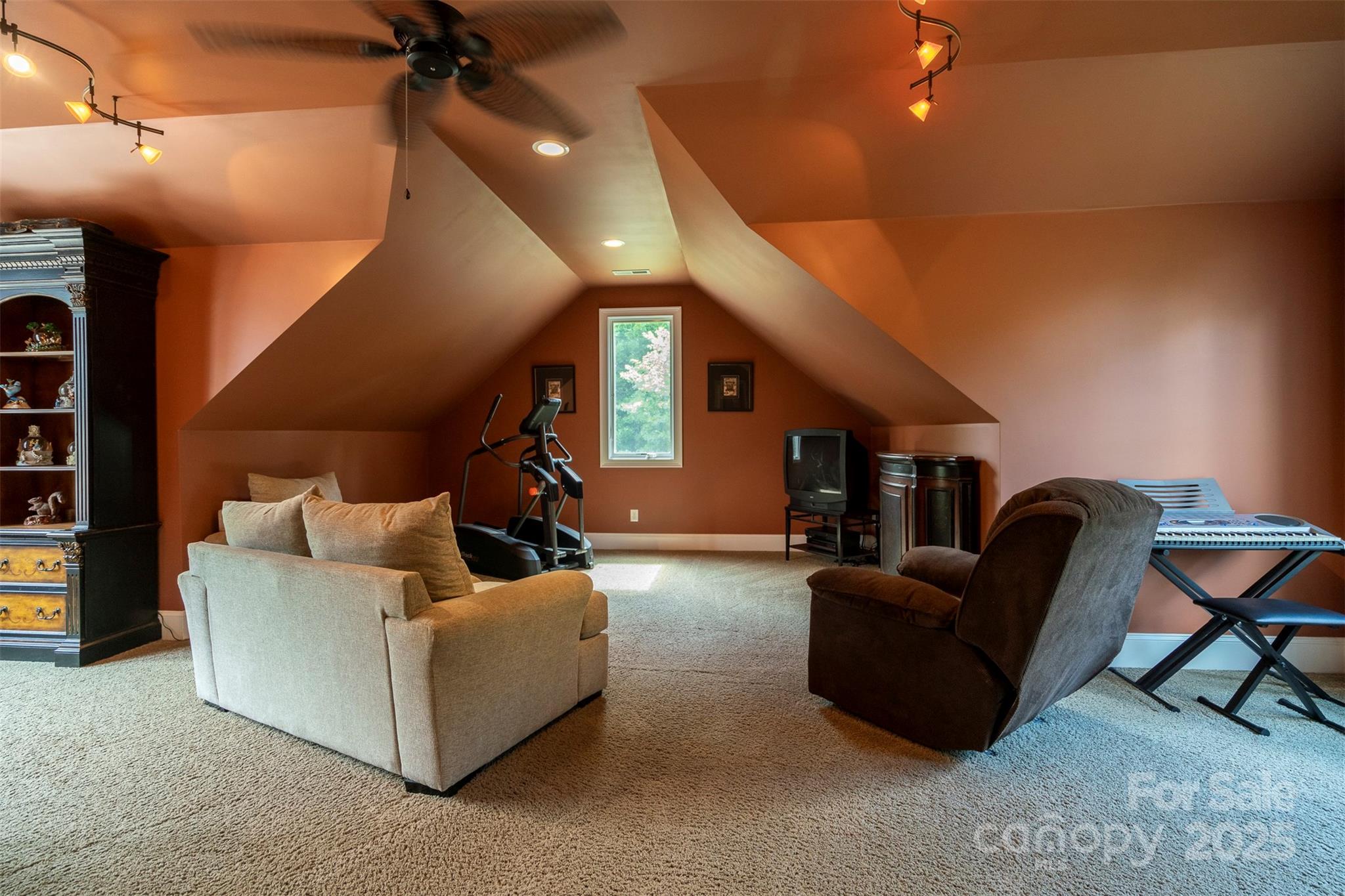 8340 Highway 801 Mount Ulla, NC 28125 - Photo 44 of 47 a living room with furniture and a potted plant