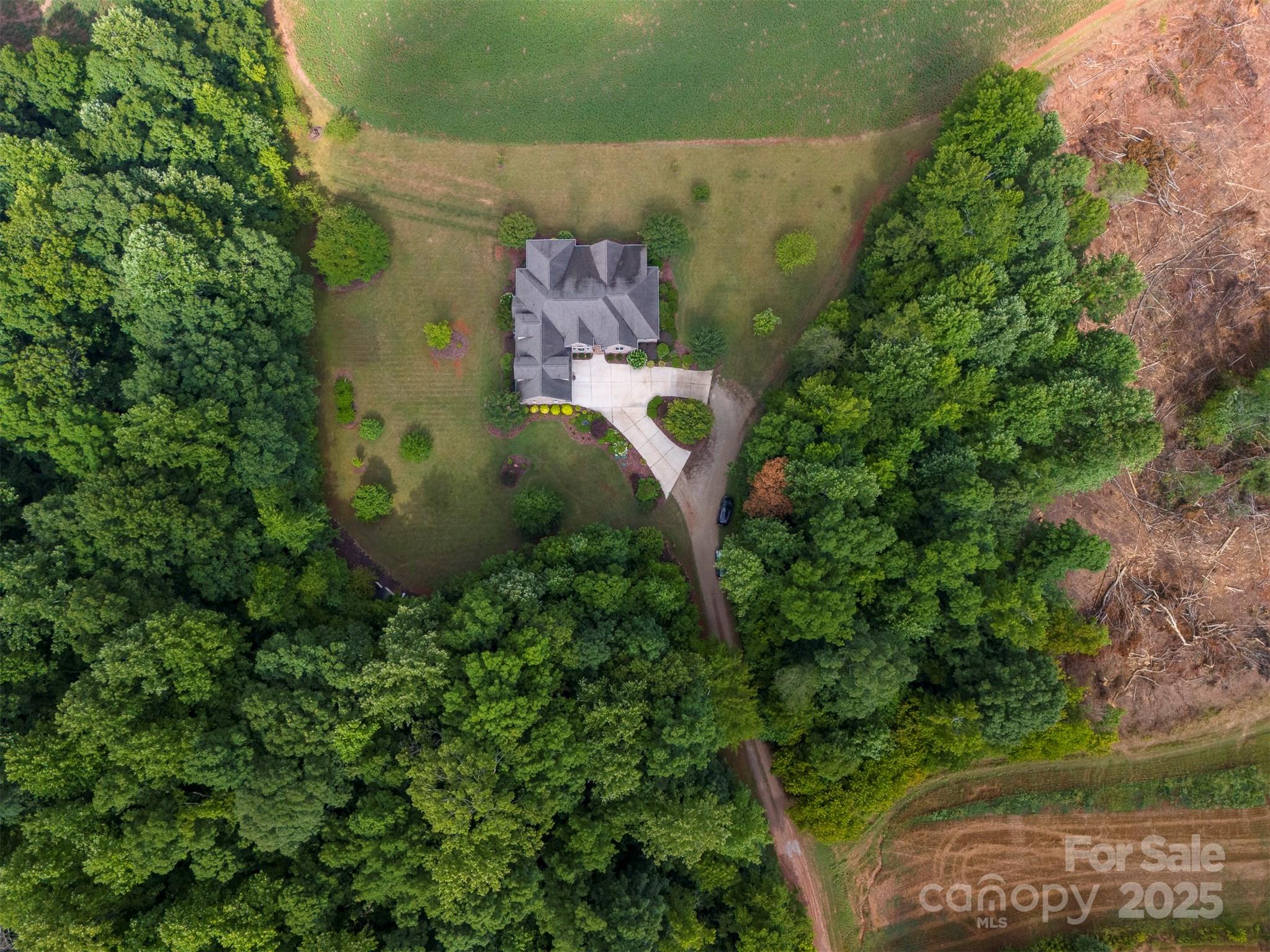 8340 Highway 801 Mount Ulla, NC 28125 - Photo 6 of 47 an aerial view of a house with a yard
