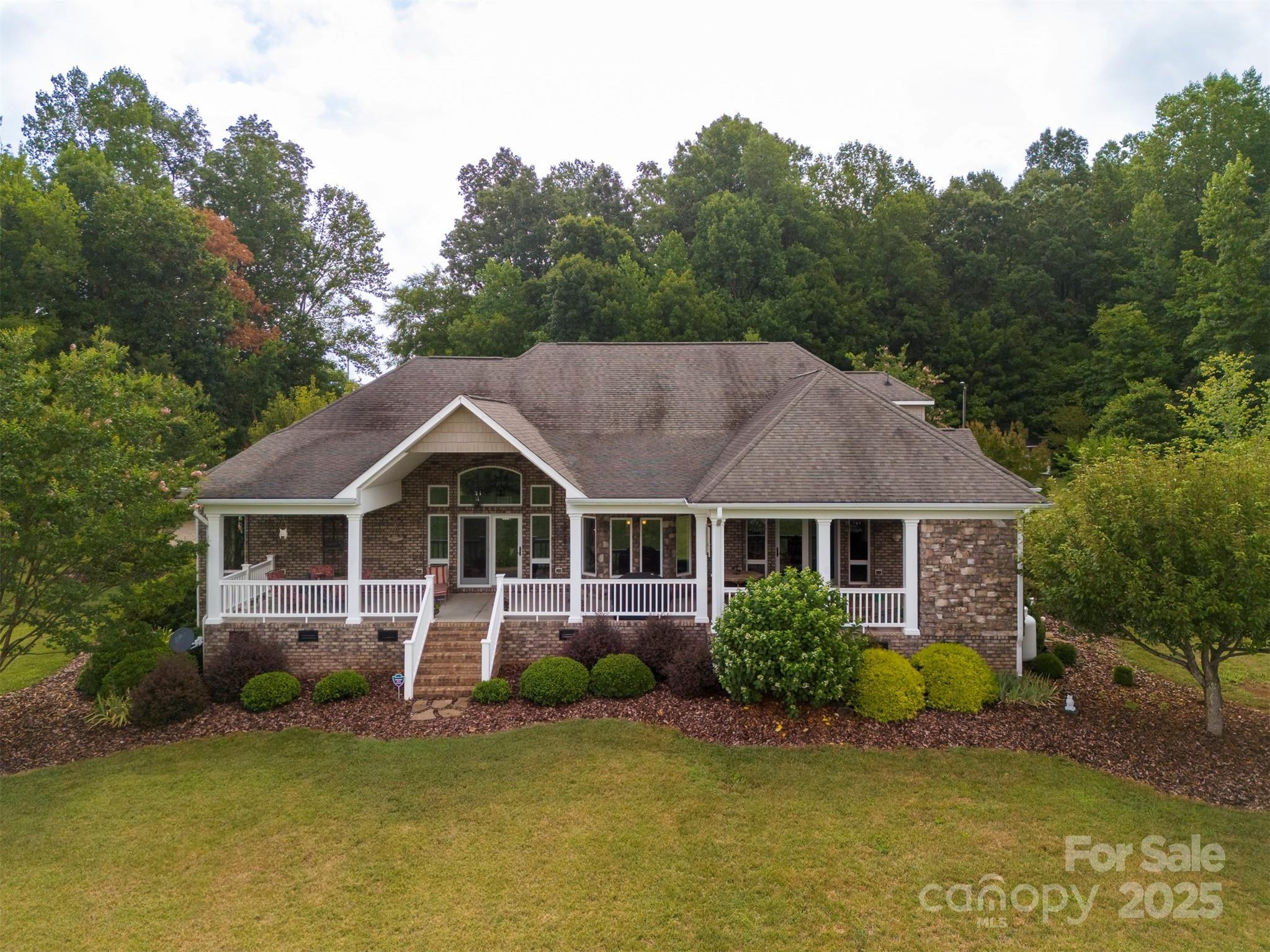 8340 Highway 801 Mount Ulla, NC 28125 - Photo 8 of 47 front view of a house with a yard