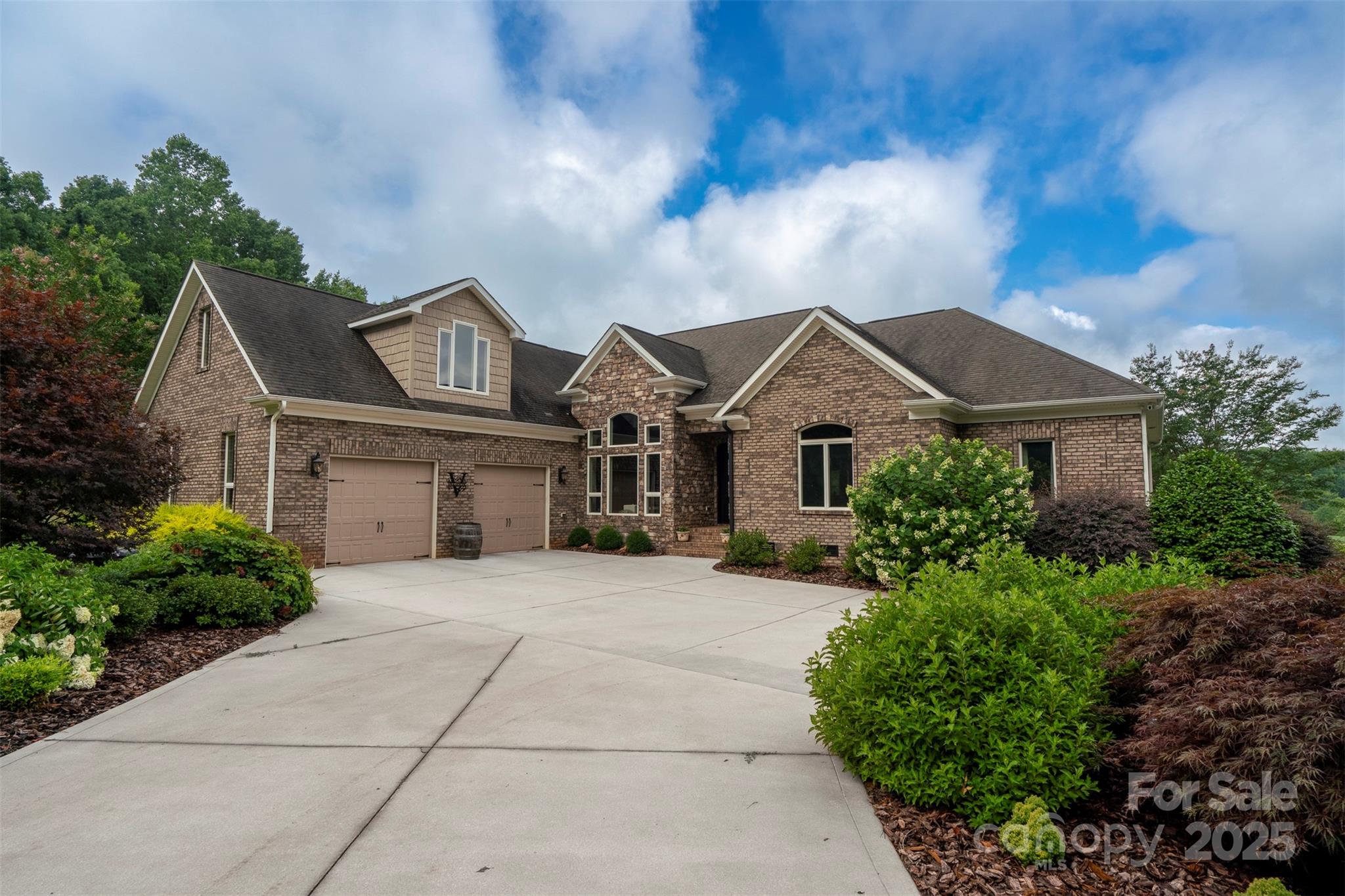 8340 Highway 801 Mount Ulla, NC 28125 - Photo 10 of 47 a front view of a house with a garden