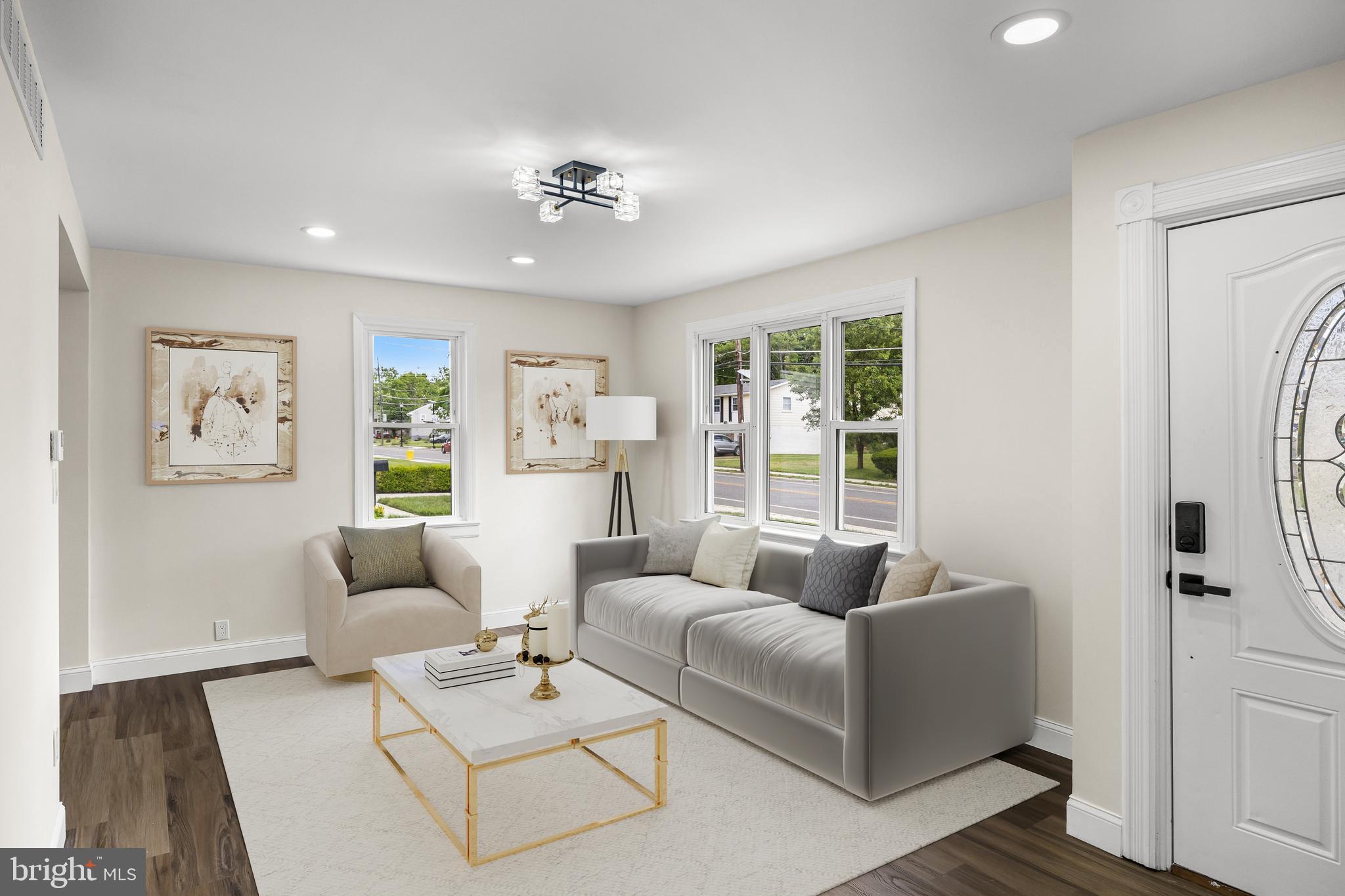 937 Clements Bridge Road Barrington, NJ 08007 - Photo 10 of 34 a living room with furniture and a large window