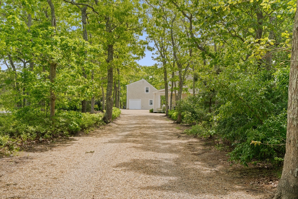 4 Hye Lane Edgartown, MA 02539 - Photo 41 of 41 a pathway of a house with yard and green space