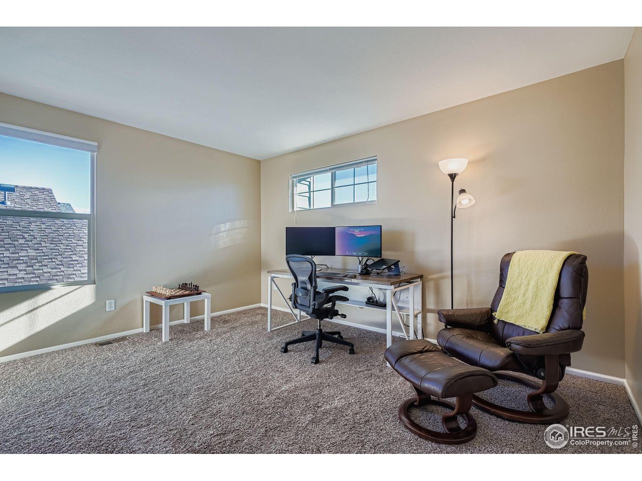 2011 Alpine Drive Erie, CO 80516 - Photo 15 of 21 a workspace with furniture and a window