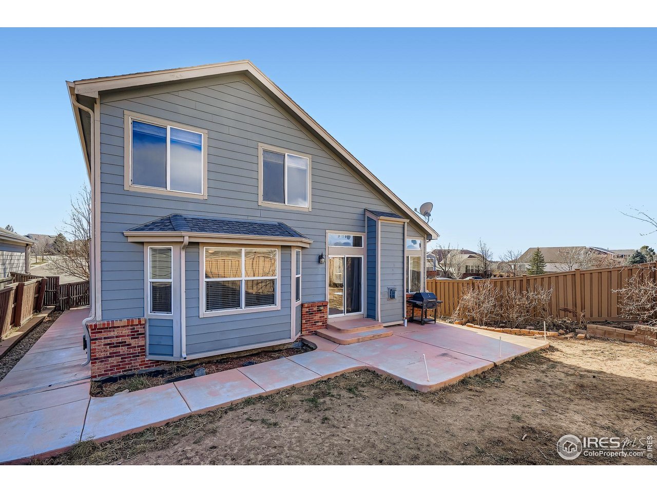 2011 Alpine Drive Erie, CO 80516 - Photo 20 of 21 a view of a house with a yard