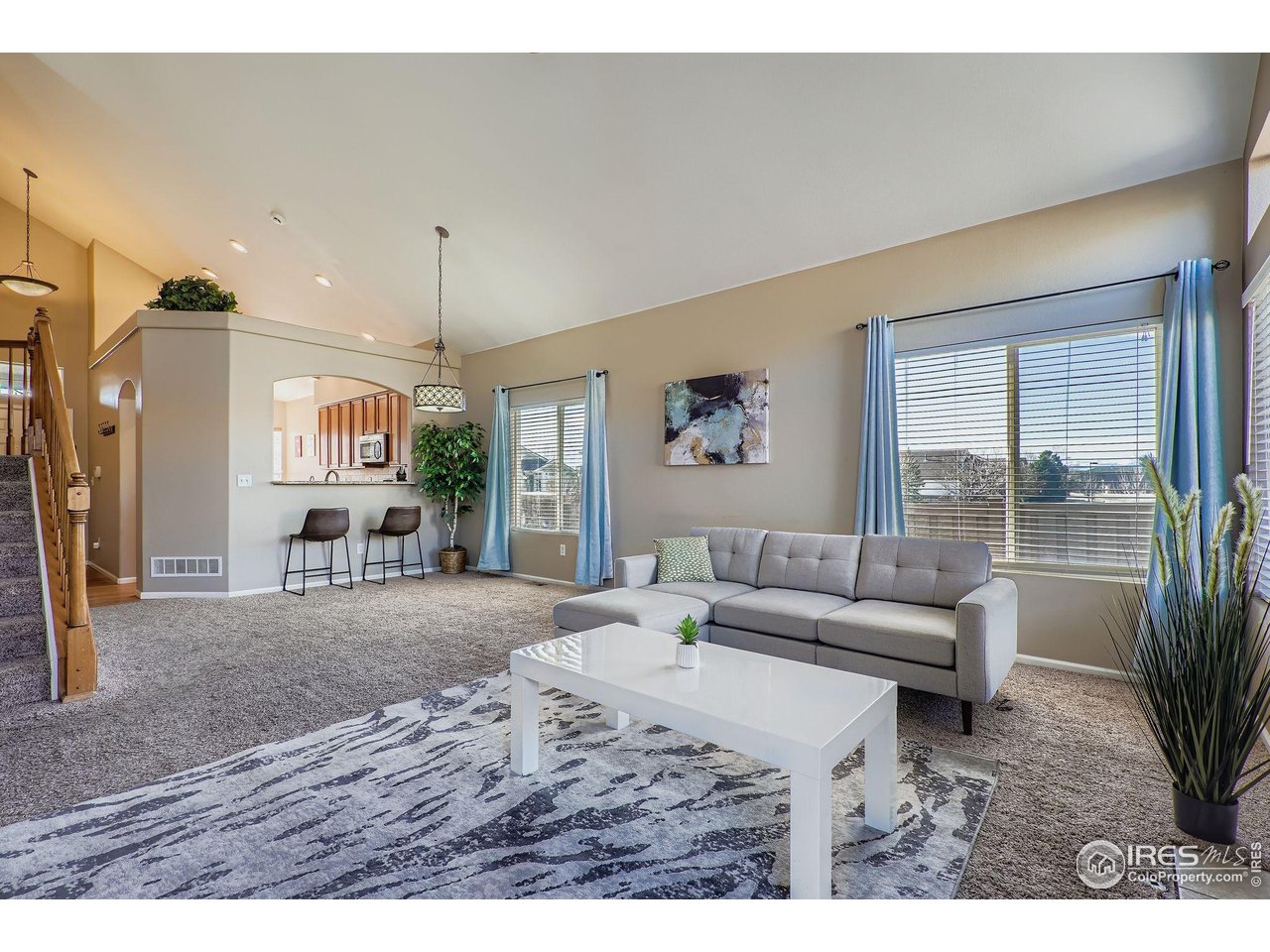 2011 Alpine Drive Erie, CO 80516 - Photo 4 of 21 a living room with furniture and a large window