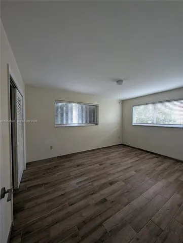 a bathroom with a sink a toilet and bathtub