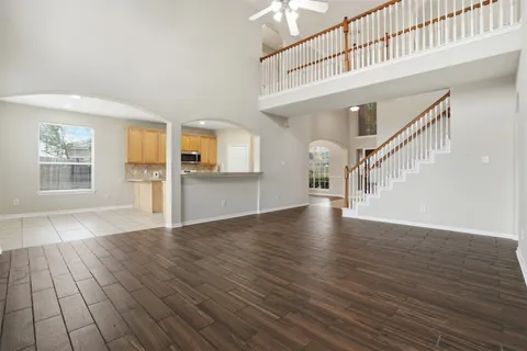 a view of an entryway with wooden floor