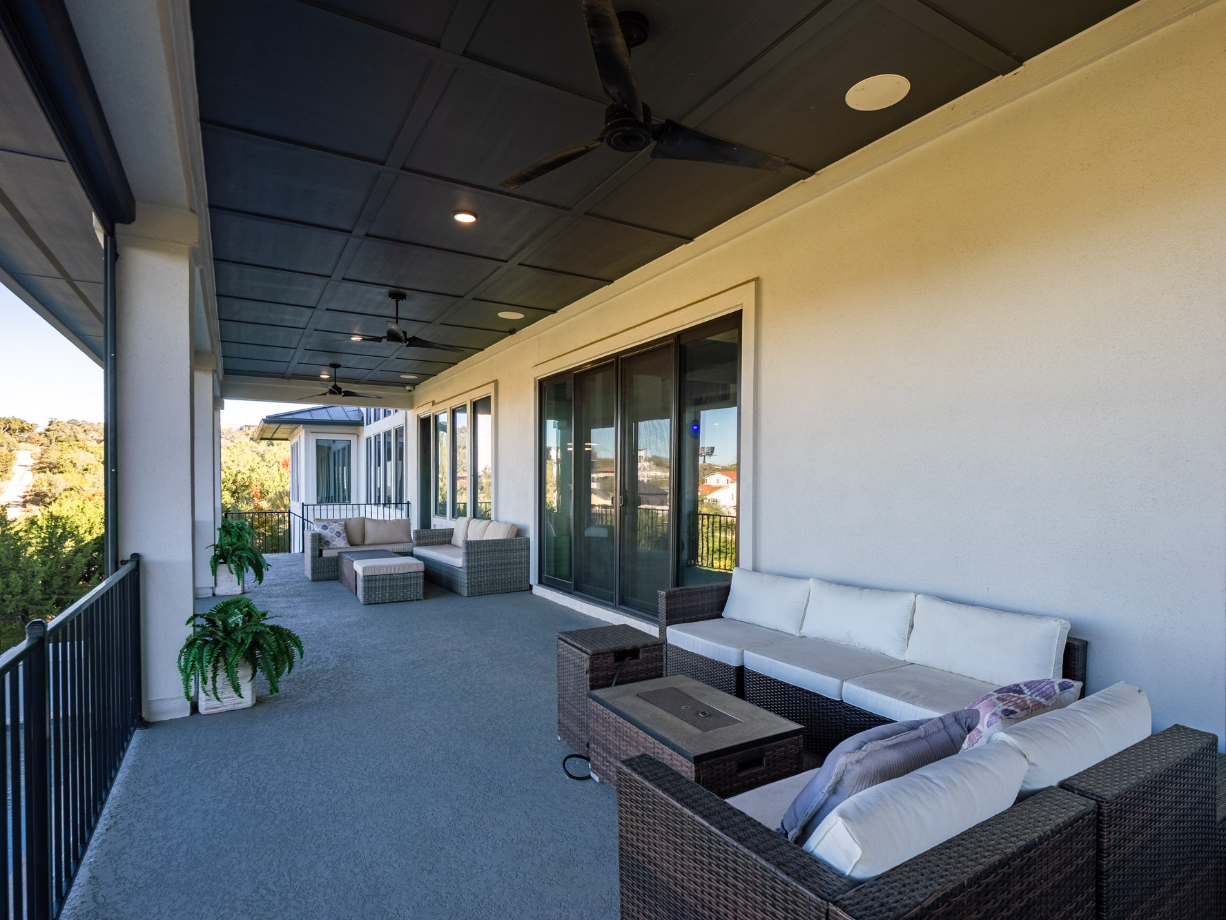 14900 Copper Ridge Lane Austin, TX 78734 - Photo 27 of 39 Patio / terrace featuring ceiling fan, an outdoor living space, and french doors