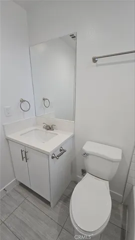 a bathroom with a toilet and a bathtub