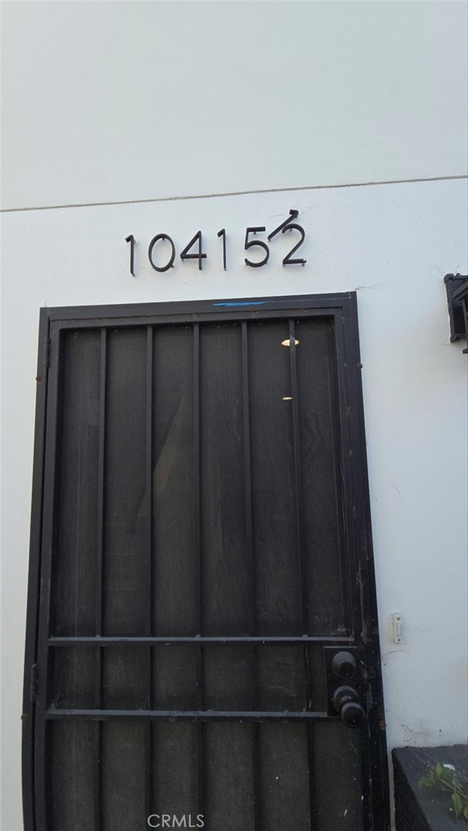 10415 1/2 Avalon Boulevard Los Angeles, CA 90003 - Photo 7 of 24 a view of wooden door
