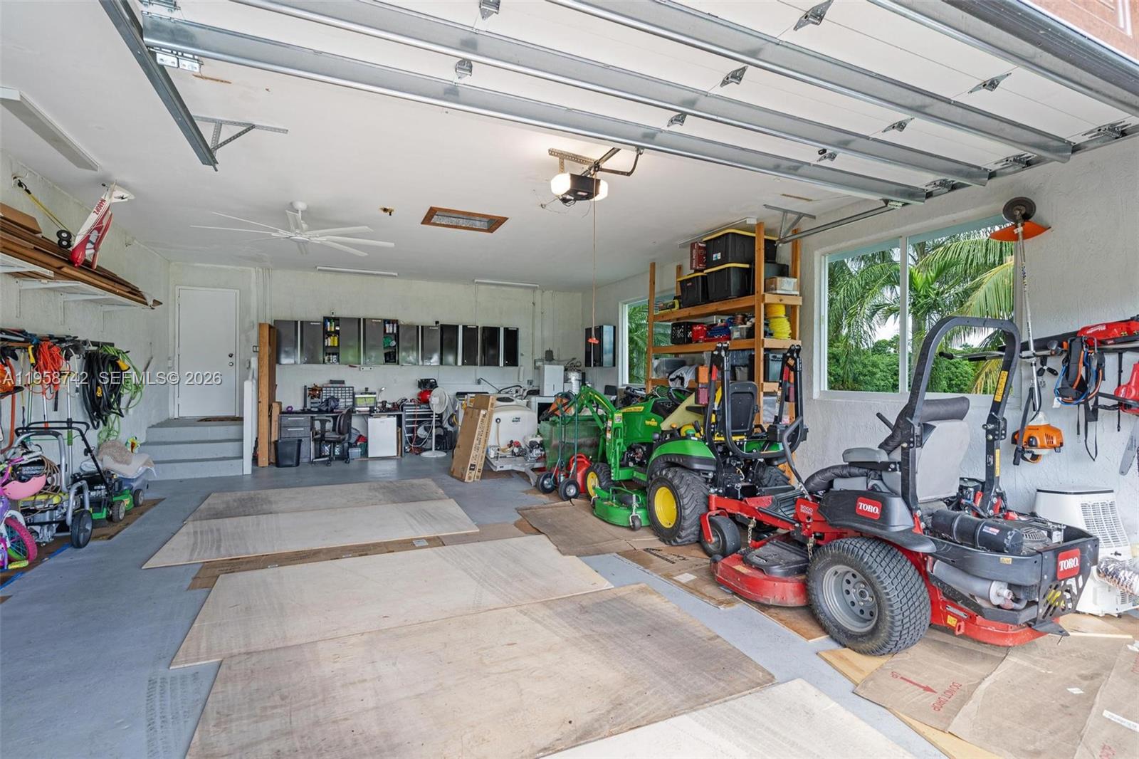 20520 Southwest 190th Street Miami, FL 33187 - Photo 17 of 39 a view of parking garage with cars