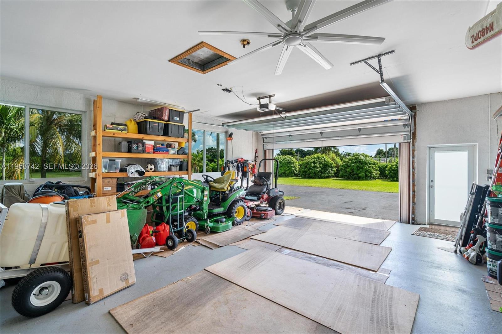 20520 Southwest 190th Street Miami, FL 33187 - Photo 18 of 39 a view of a room with gym equipment and a large window