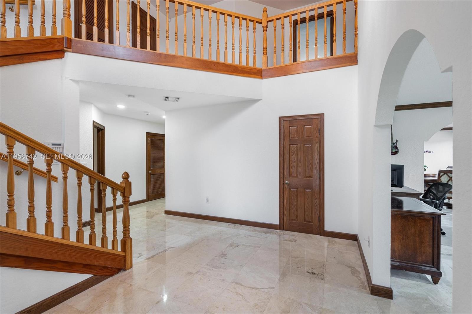 20520 Southwest 190th Street Miami, FL 33187 - Photo 8 of 39 a view of staircase with white walls and stairs