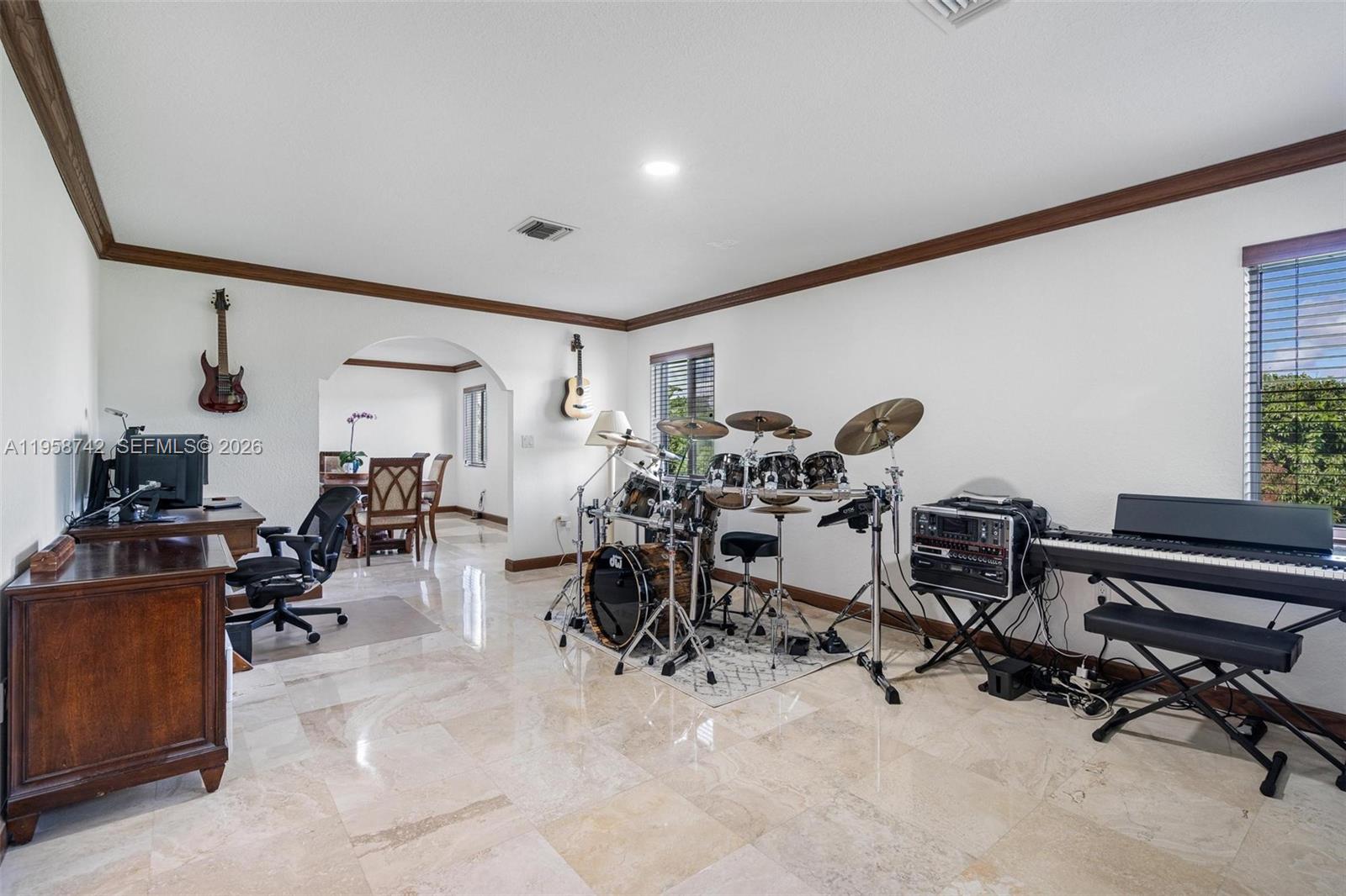 20520 Southwest 190th Street Miami, FL 33187 - Photo 9 of 39 a room with gym equipment and a view of living room