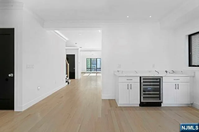 a bathroom with a bathtub and a sink