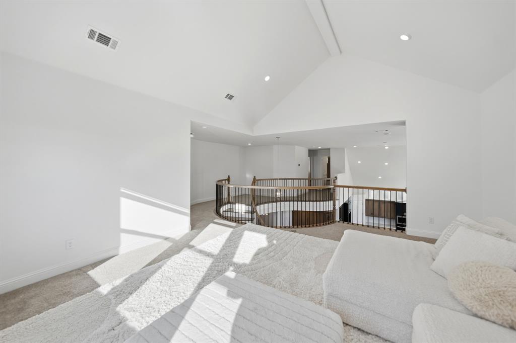 1227 Calebria Way Fate, TX 75087 - Photo 13 of 34 a living room with furniture and a fireplace